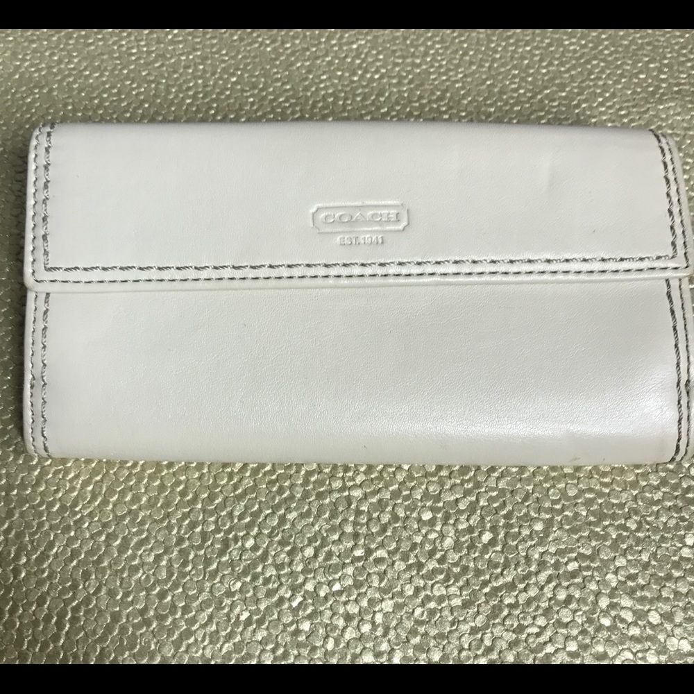 White cream colored Coach wallet